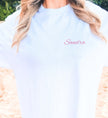 Elegant white organic cotton old money bachelorette shirt from Cincerely Yours with minimalist classy design for the elegant bride to be squad.