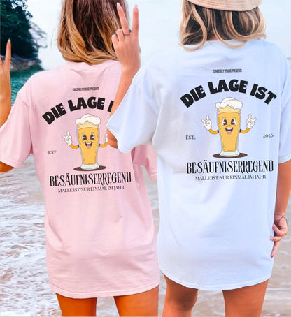 Detaillierte Ansicht des hochwertigen Textildrucks mit dem lustigen Bier Maskottchen und dem Text Die Lage ist besäufniserregend für echte Party Fans.