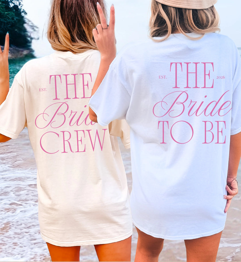 Flatlay of organic cotton bride to be crew bach shirts by Cincerely Yours in aesthetic neutral beige and vintage hunter green colors.