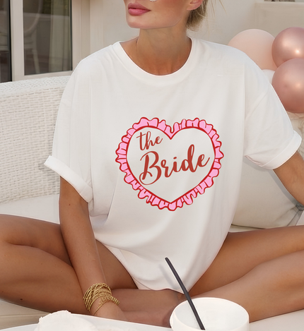 custom the bride shirt, coquette heart bride tee, personalized future mrs, pink red bachelorette tee, ruffled heart bride shirt, getting ready bridal top, custom name bride to be, coquette bachelorette top, trendy oversized bride tee, girly bachelorette party, aesthetic engagement gift, custom mrs last name shirt, pink heart future mrs tee
